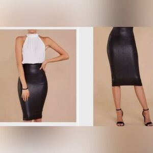 Spanx Faux Leather Pencil Skirt
Size Medium Black Pull On
Tummy Control